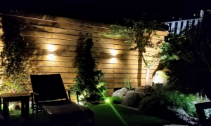 back patio with wall lighting