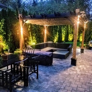 arbor with lighting and patio lounge